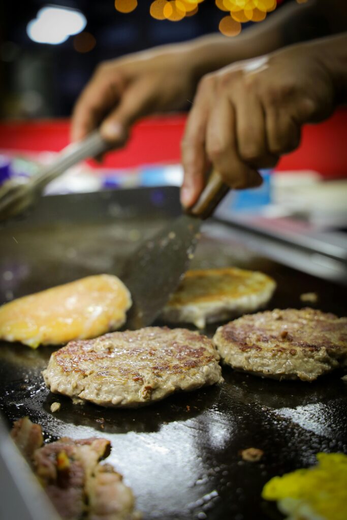 grilling homemade burger patties